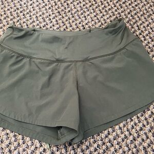 Green vuori running shorts